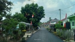 Proyek Pengaspalan Jalan di Desa Gunung Raja Dalam Sorotan: Kepentingan Sosial vs Politik.